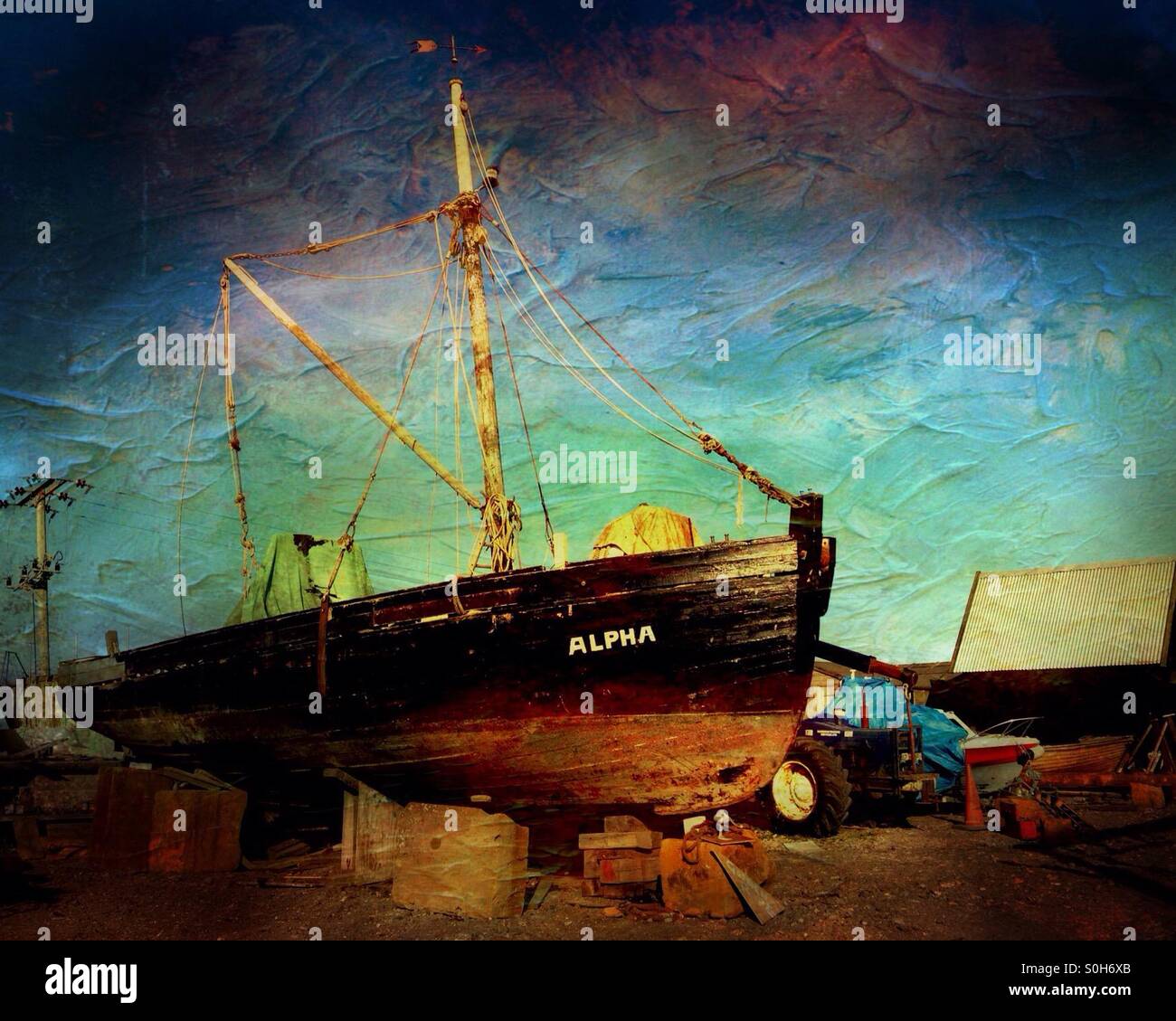 Sail boat ashore at Southwold harbour, Suffolk, England. - Smartphone Captured Stock Image