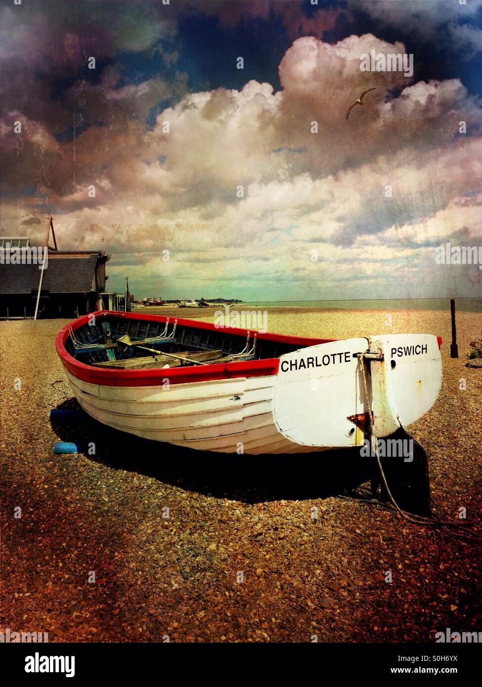 Rowing boat on the beach at Aldeburgh, Suffolk, England. - Smartphone Captured Stock Image