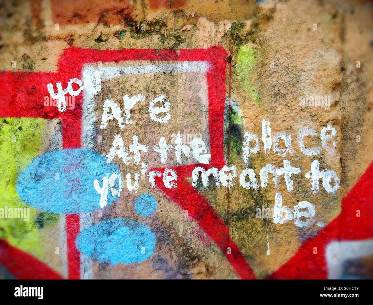 Profound graffiti message on wall. Stock Photo
