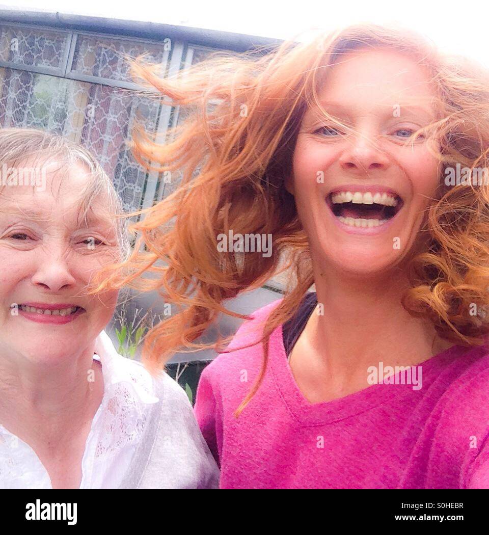 Mum and daughter laughing and joking Stock Photo