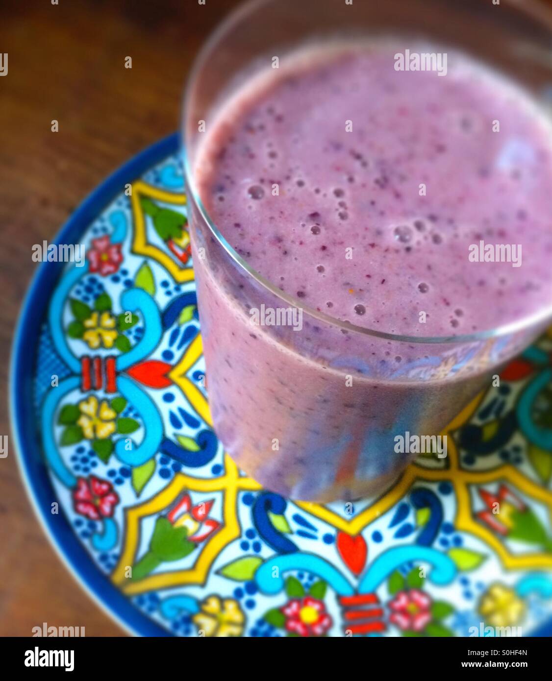 Almond milk berry papaya smoothie Stock Photo