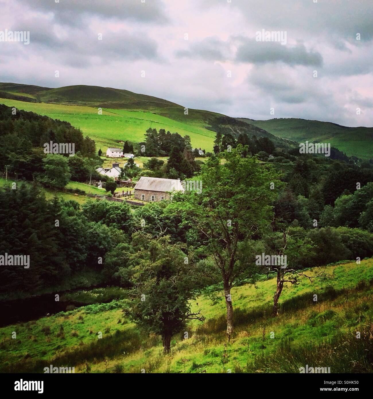 View across the valley to the Georgian Chapel at Ponterwyd, Ceredigion, Wales. Stock Photo
