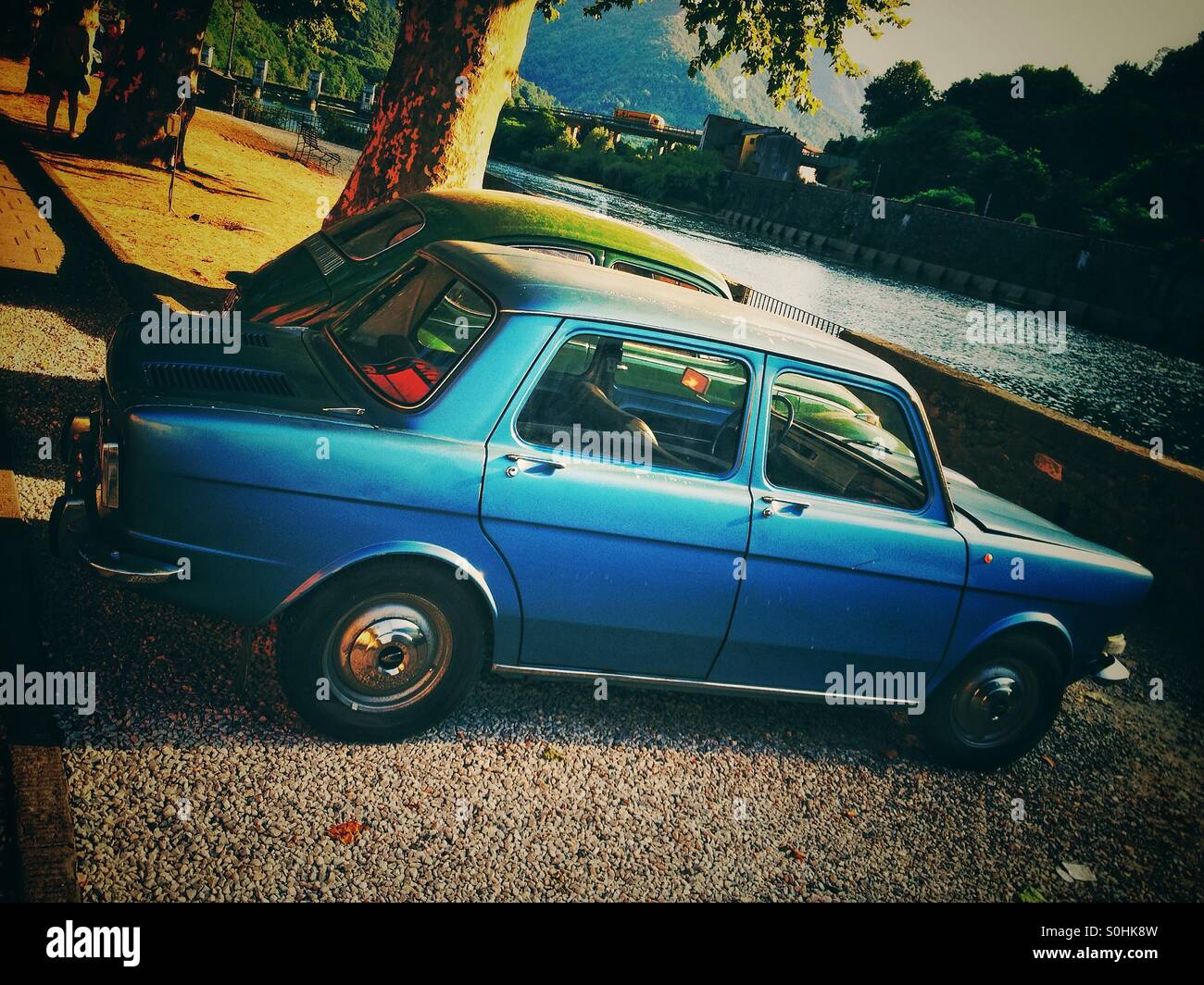 Old cars by river Serchio Italy - Smartphone Captured Stock Image