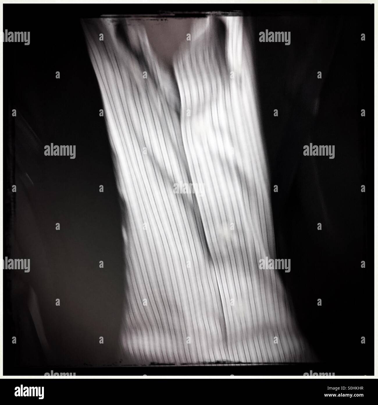 Black striped shirt hi-res stock photography and images - Alamy