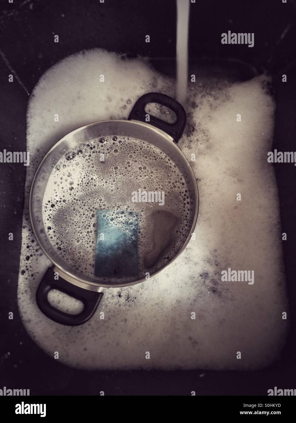 Dirty dishes cleaning,running water - Smartphone Captured Stock Image