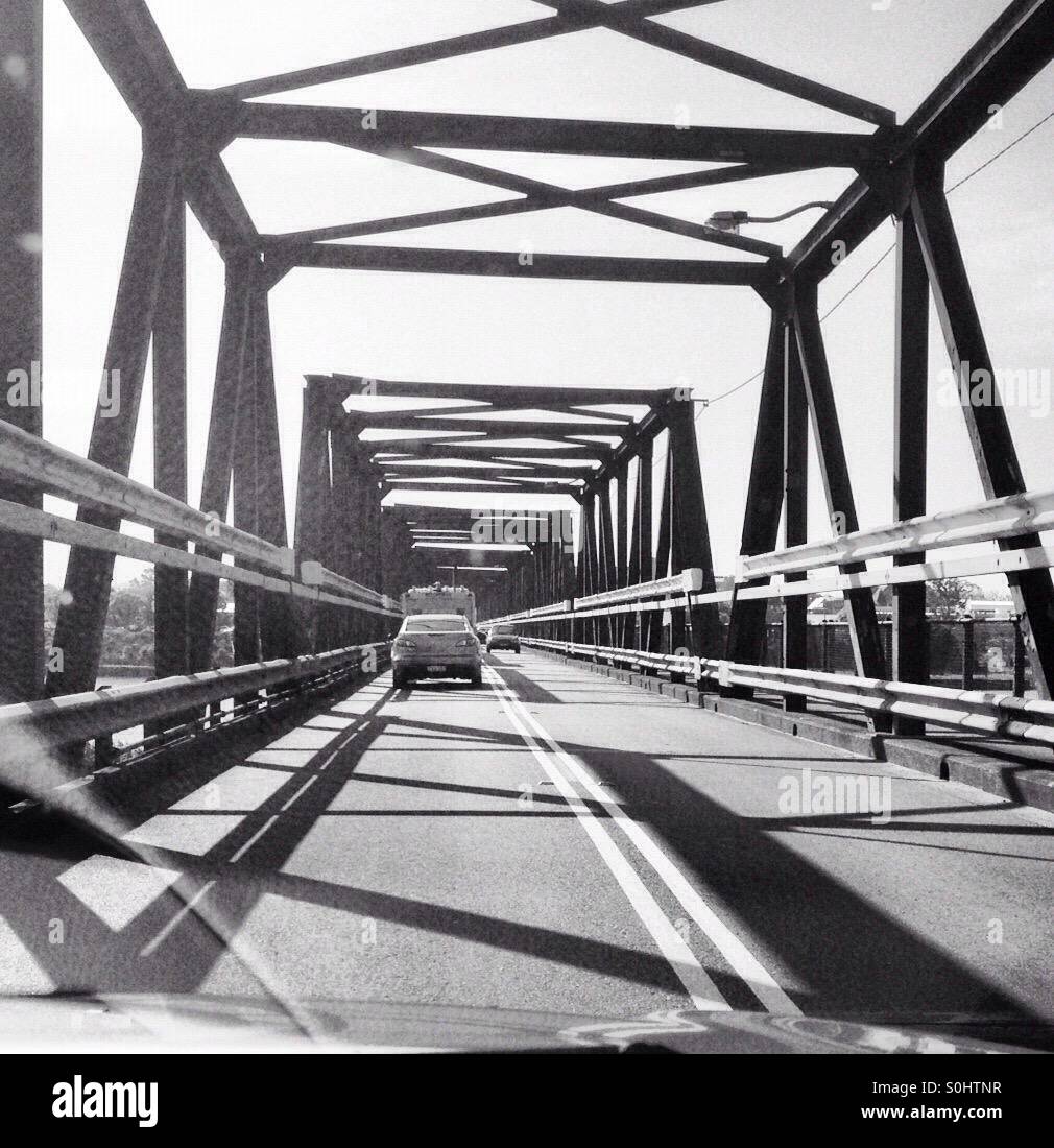 Cars crossing the Manning River at Taree, Australia. Taken from a car on left side of road - Smartphone Captured Stock Image