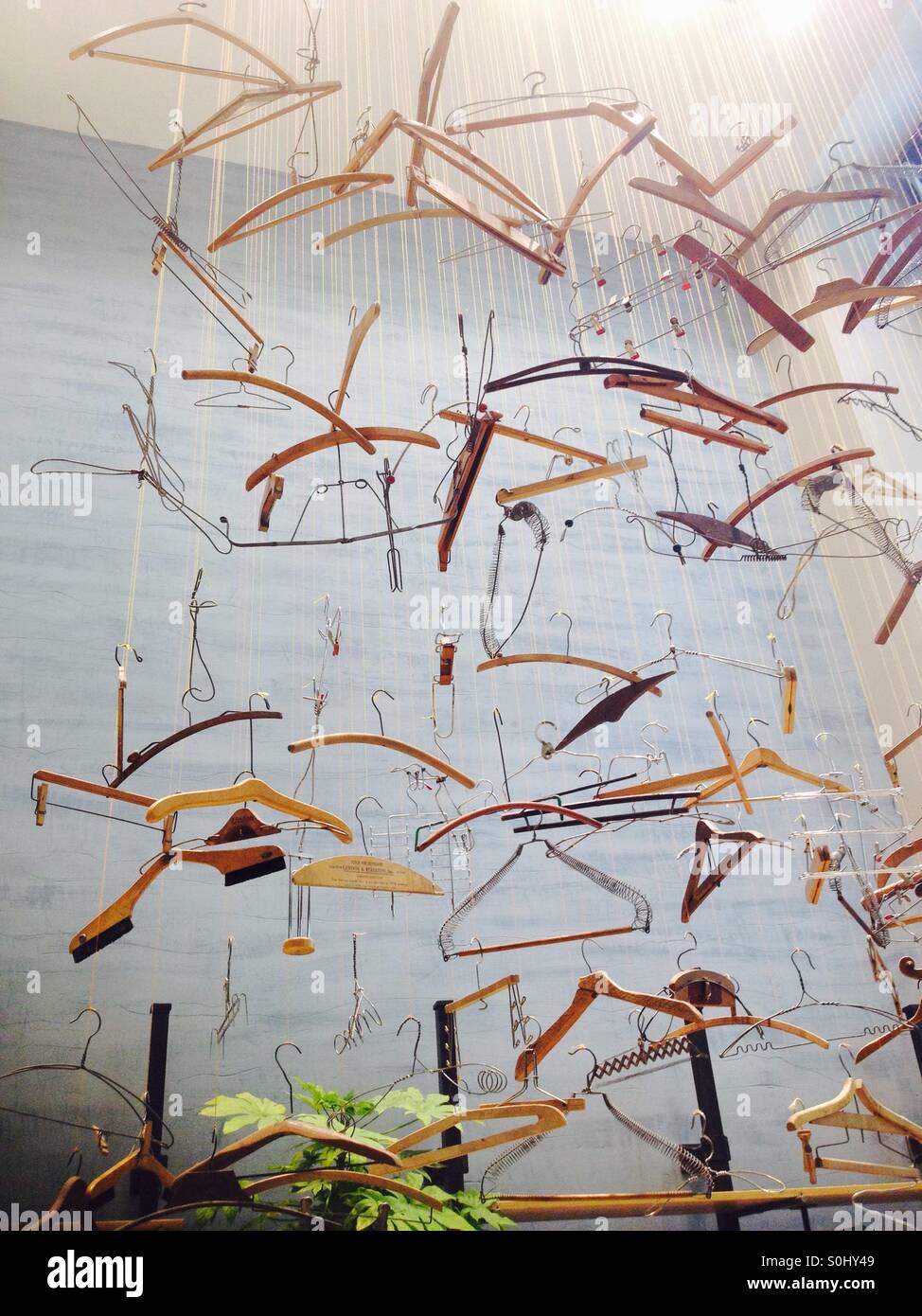 Coat hangers in Fashion store in Paris Stock Photo Alamy