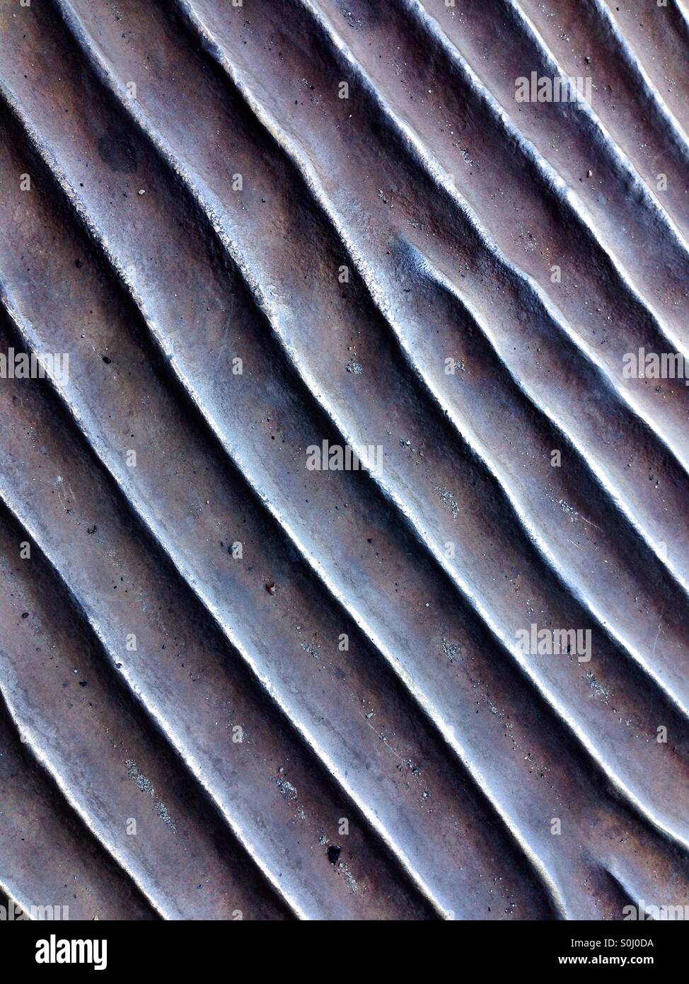 Pattern in metal, grooves and ridges - Smartphone Captured Stock Image