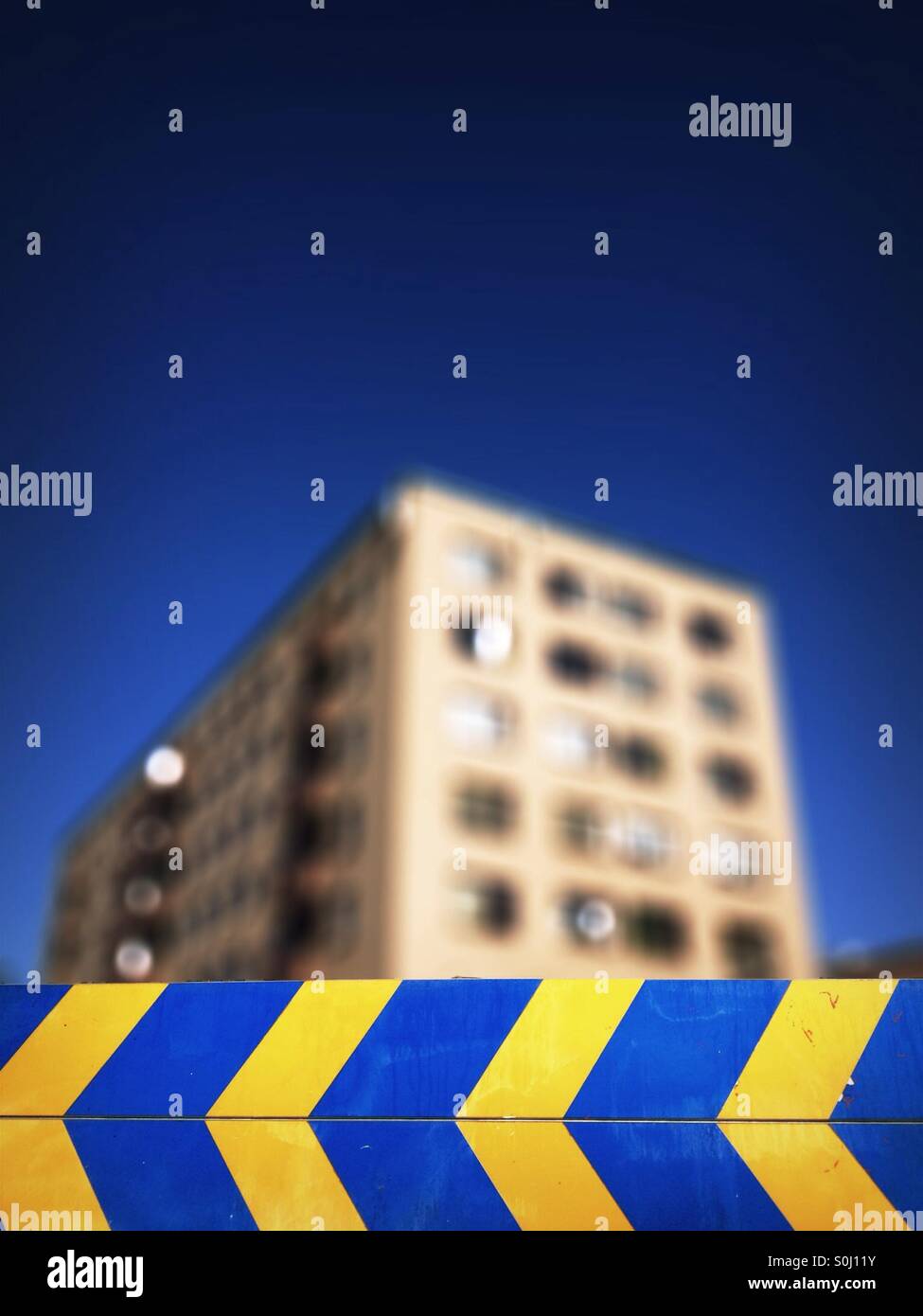 Direction sign in Swedish Flag colours - Smartphone Captured Stock Image