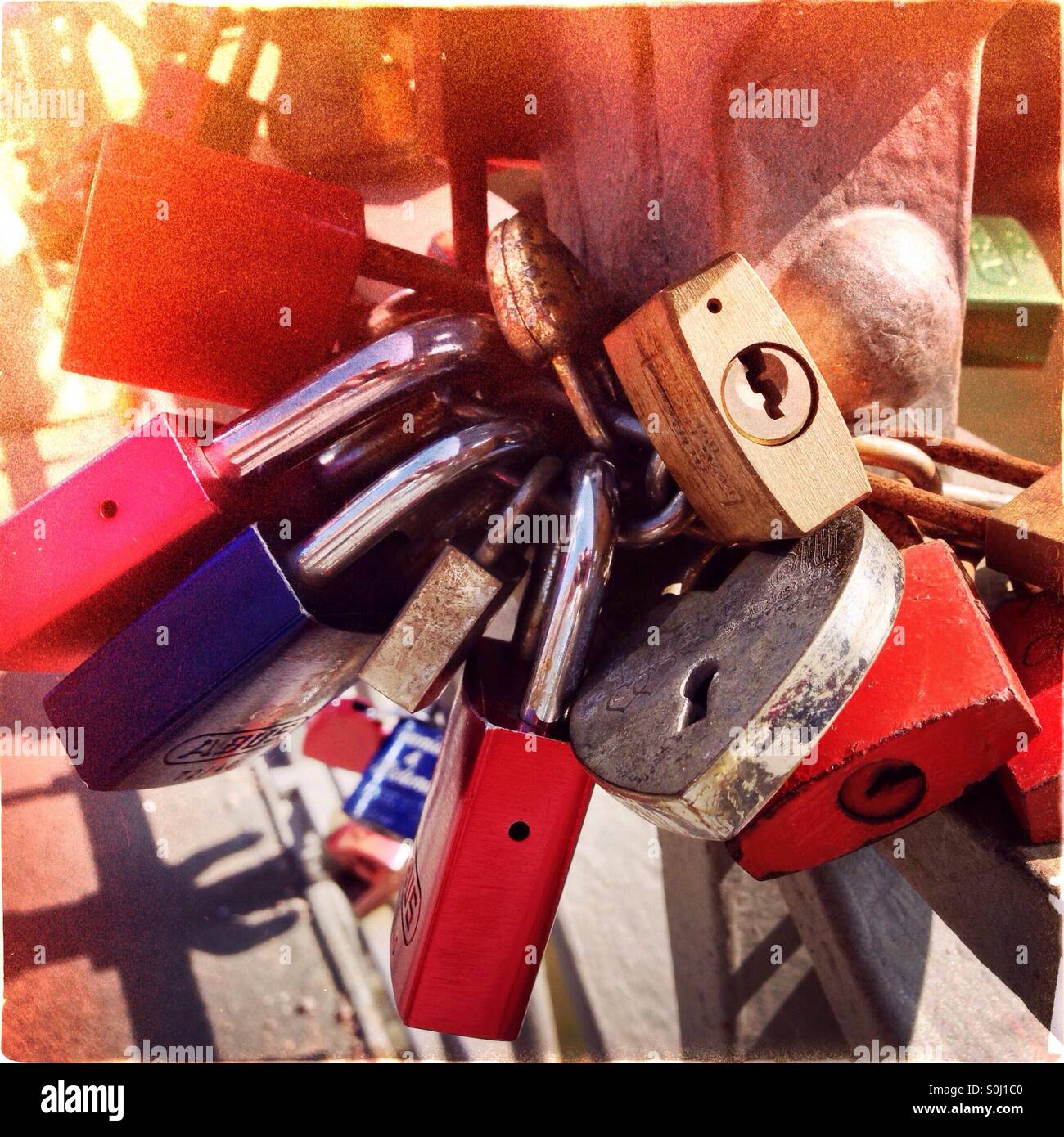 Love locks on a bridge in the warehouse district Speicherstadt in Hamburg, Germany - Smartphone Captured Stock Image