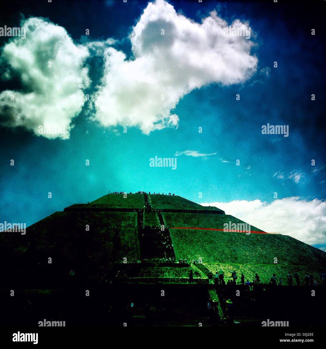 White clouds over the Pyramid of the Sun in Teotihuacan, Mexico - Smartphone Captured Stock Image