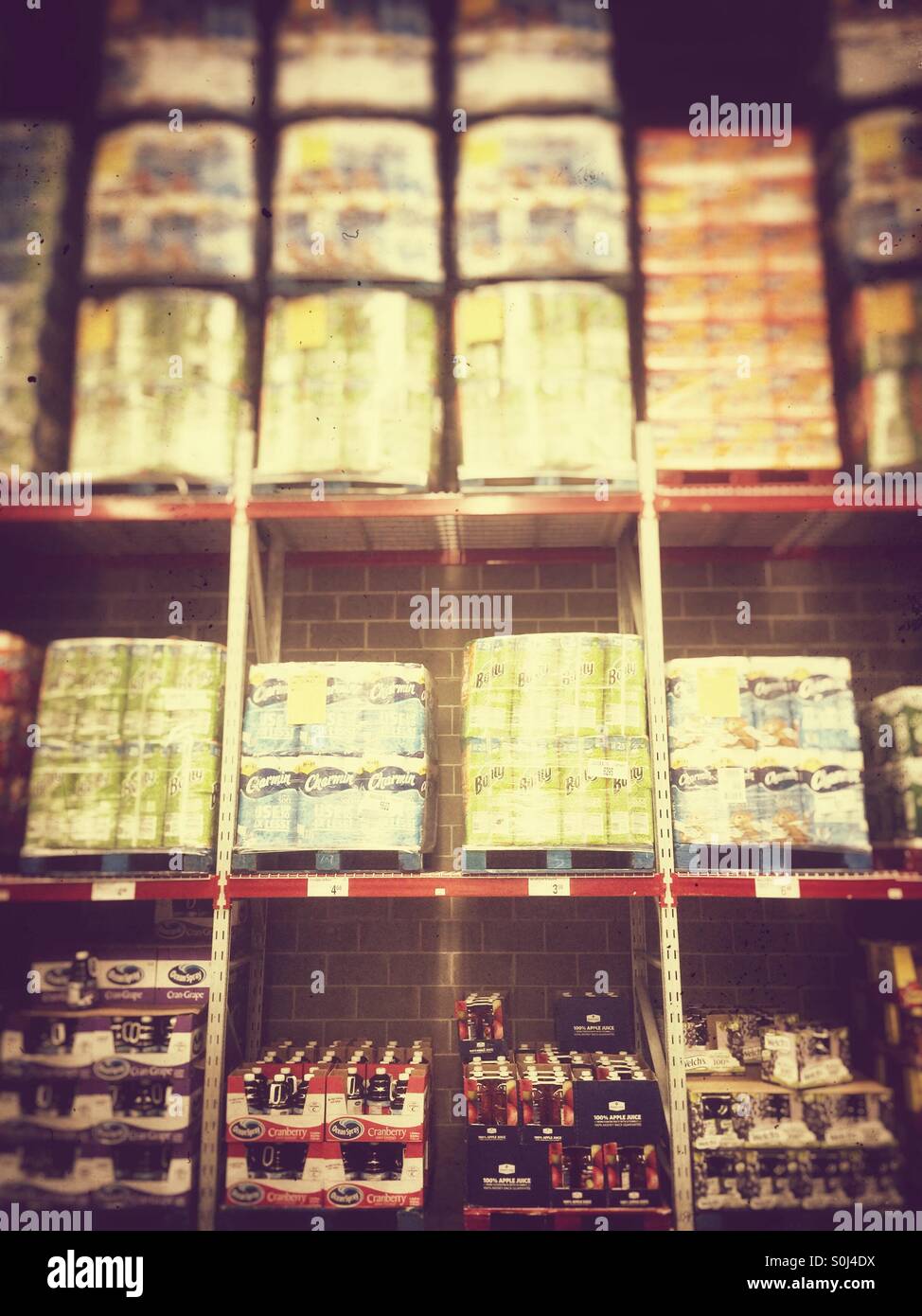 Wall of merchandise at a warehouse club - Smartphone Captured Stock Image