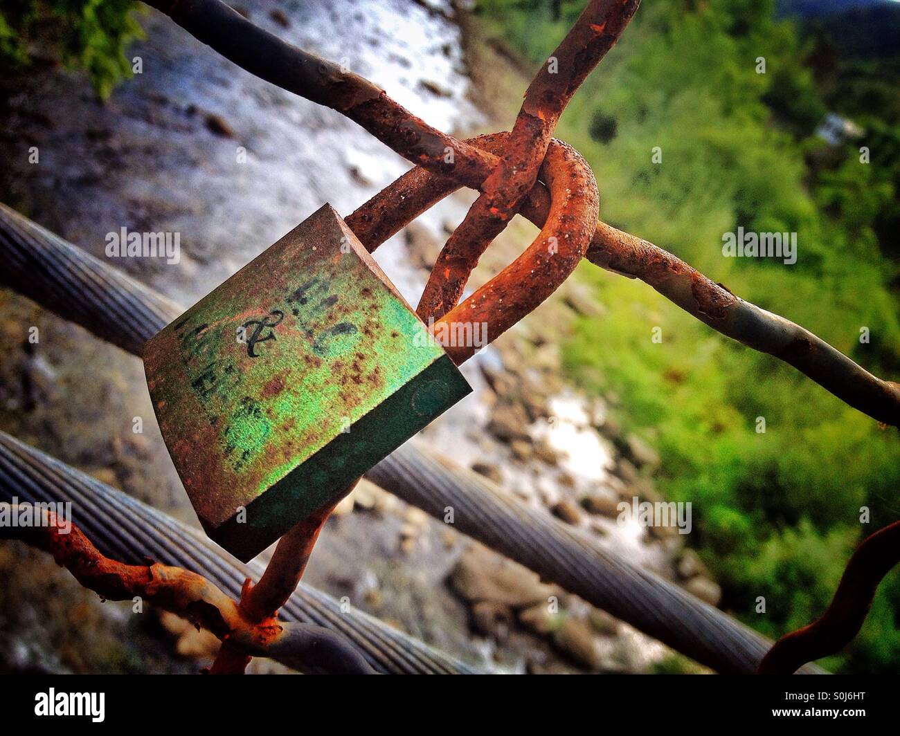 Lover's padlock on bridge in Bagni Di Lucca Italy - Smartphone Captured Stock Image