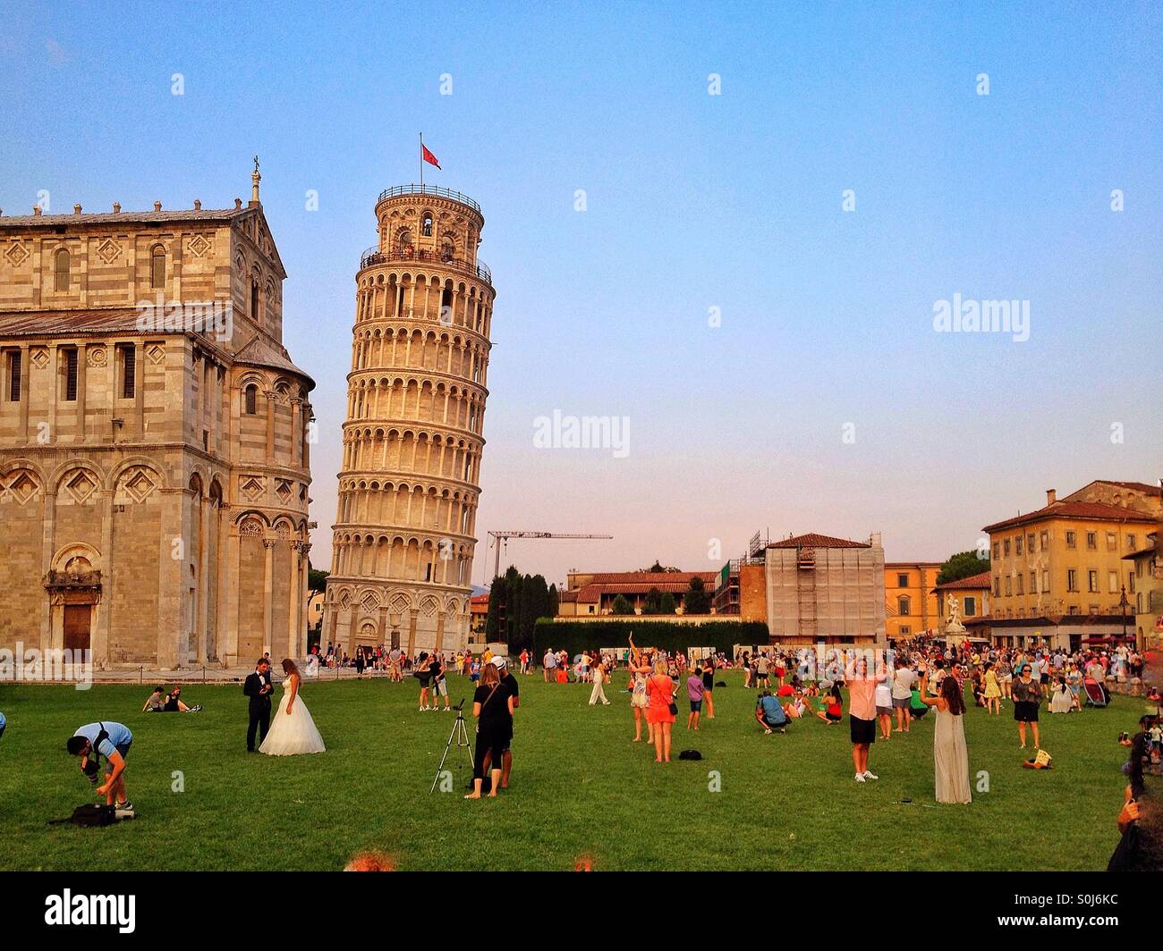 People visit the leaning tower of Pisa Italy Stock Photo