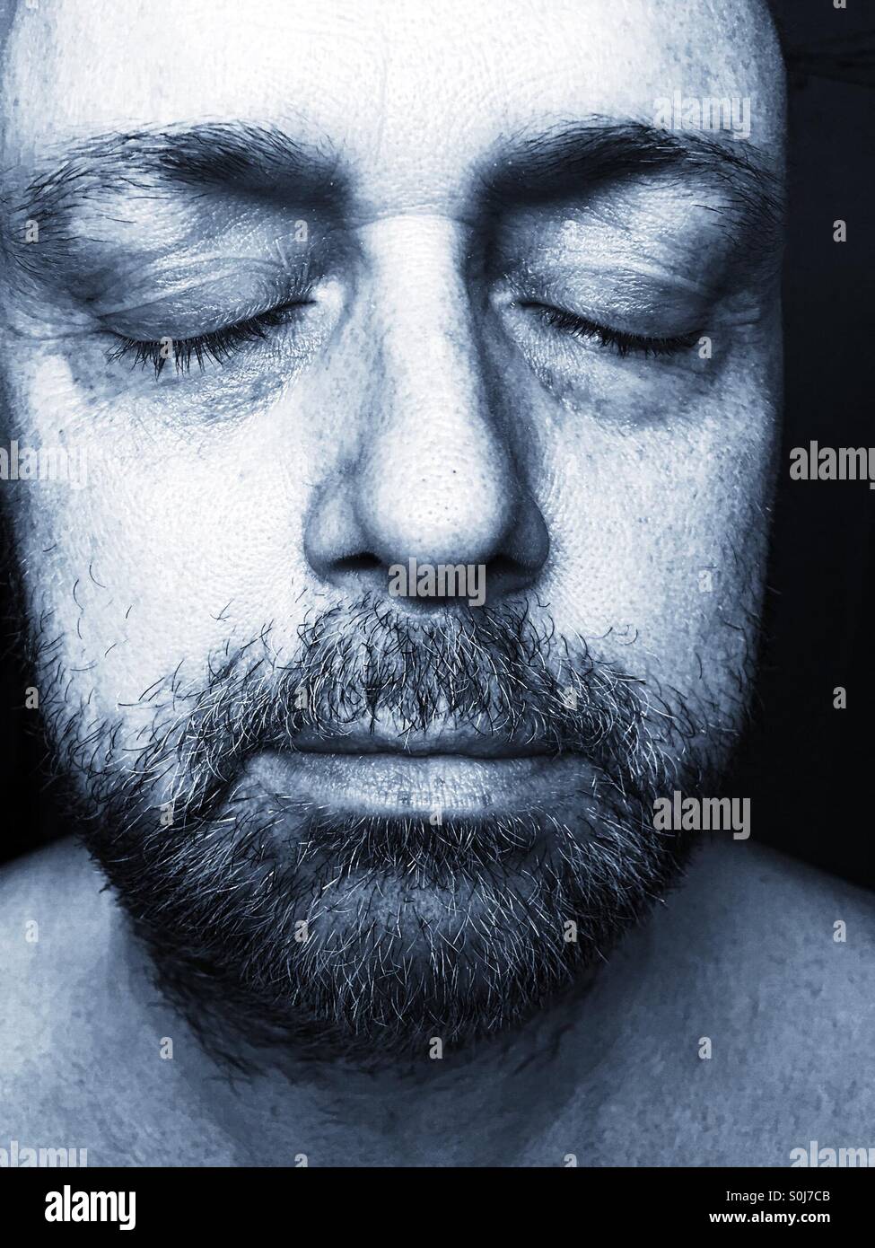 Middle-aged Man Eyes Shut - Smartphone Captured Stock Image