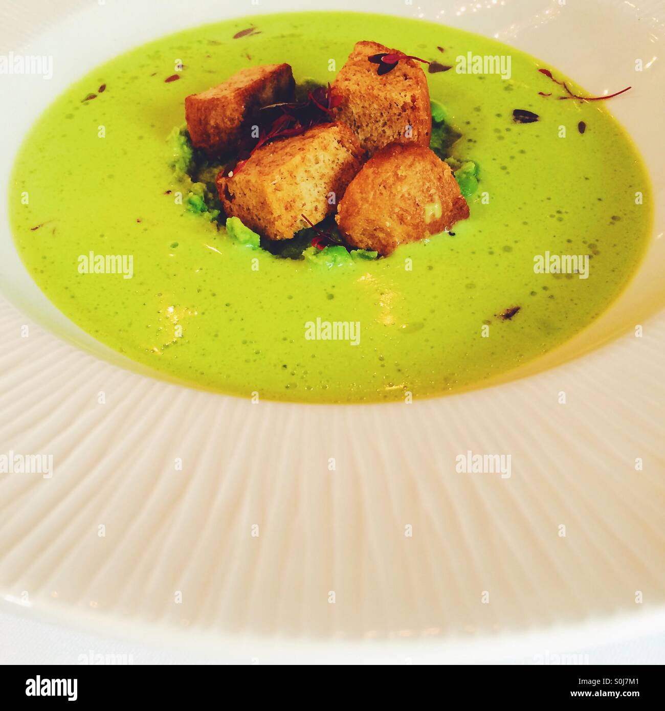 Bright green spring pea soup - Smartphone Captured Stock Image