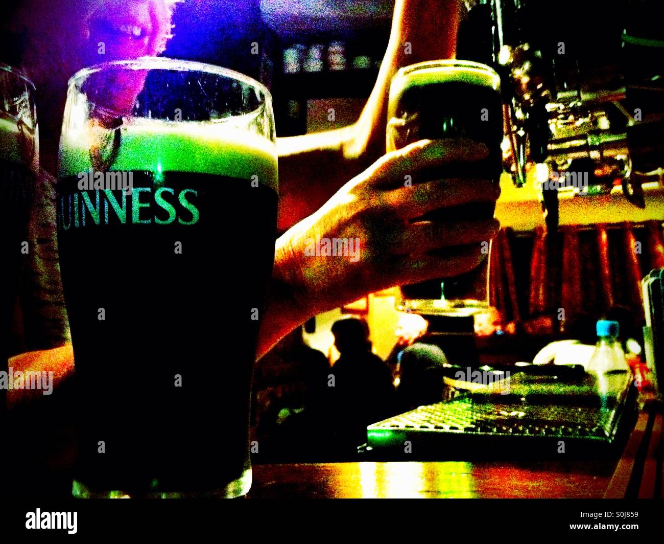 Pulling a pint at the bar - Smartphone Captured Stock Image
