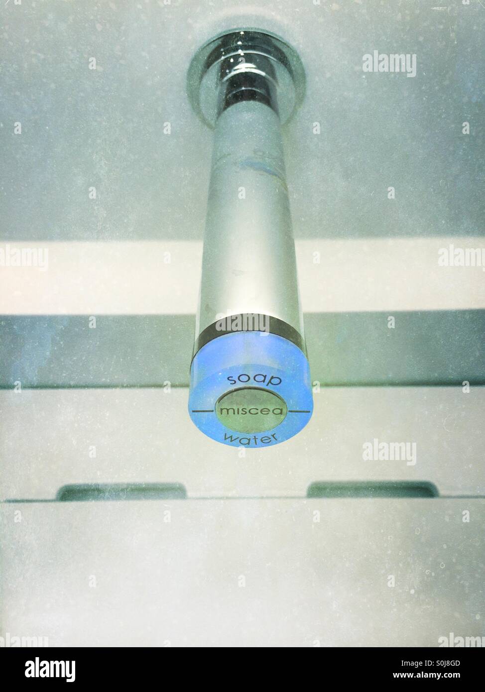 Electronic sensor tap. Soap & water - Smartphone Captured Stock Image