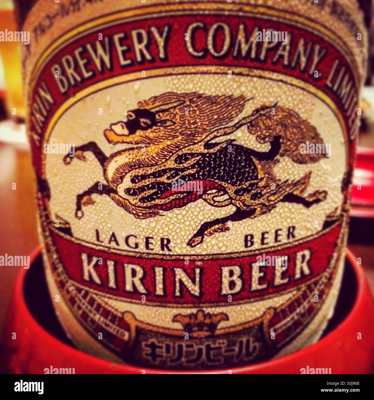 Kirin beer bottle label covered in fine water droplets Stock Photo