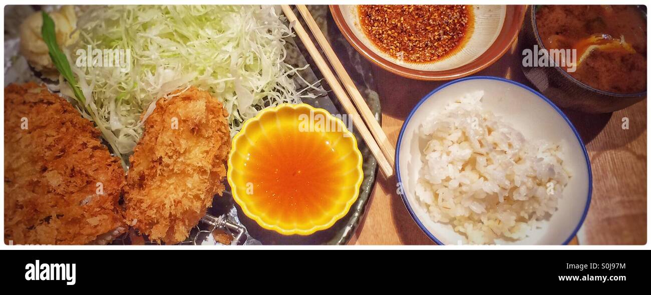 Pork tenderloin katsu meal with sticky rice and sesame sauce, sticky