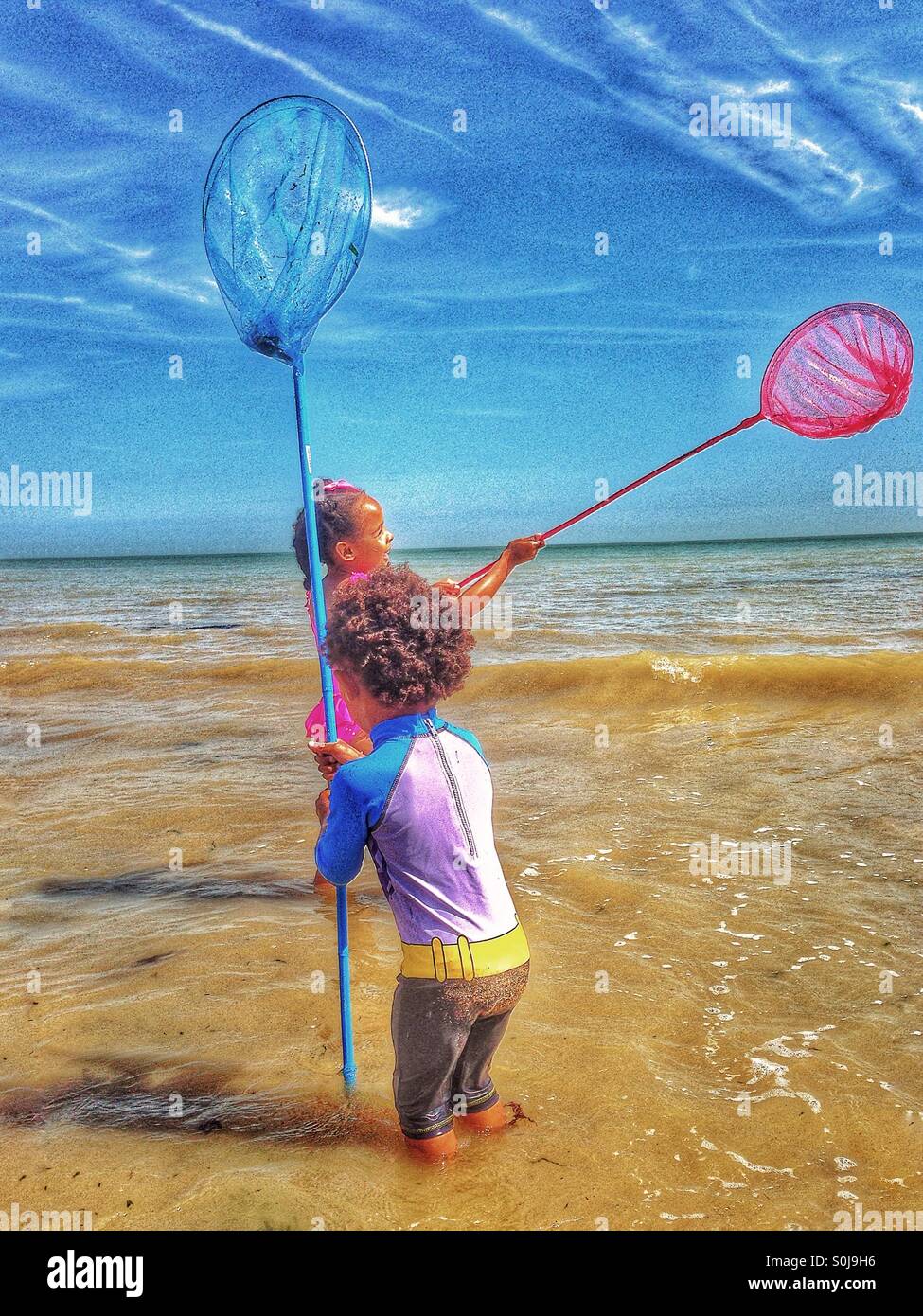 Children with fishing nets Stock Photo Alamy