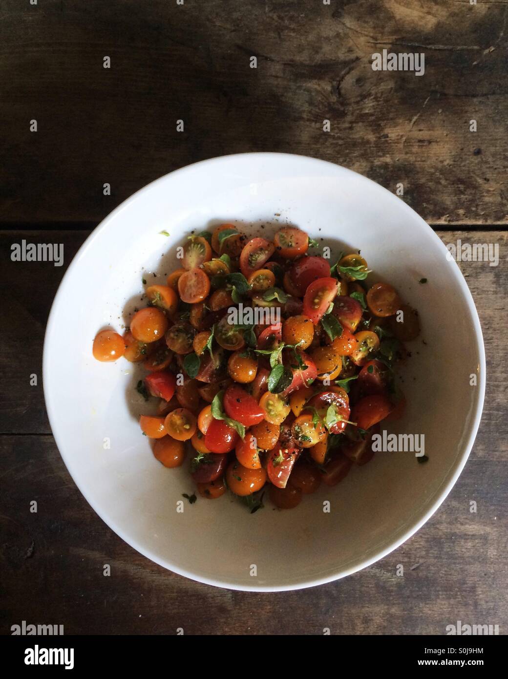 Heirloom cherry tomato salad. - Smartphone Captured Stock Image