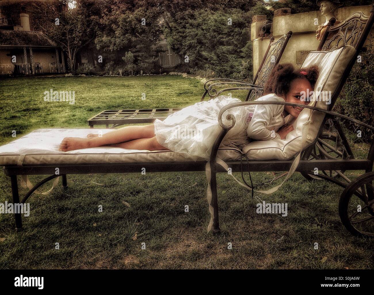 The girl in the garden. - Smartphone Captured Stock Image