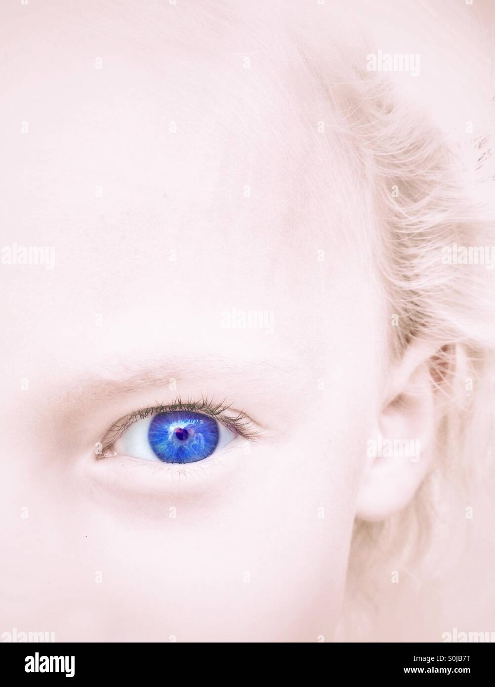 Blue eyed girl Stock Photo Alamy
