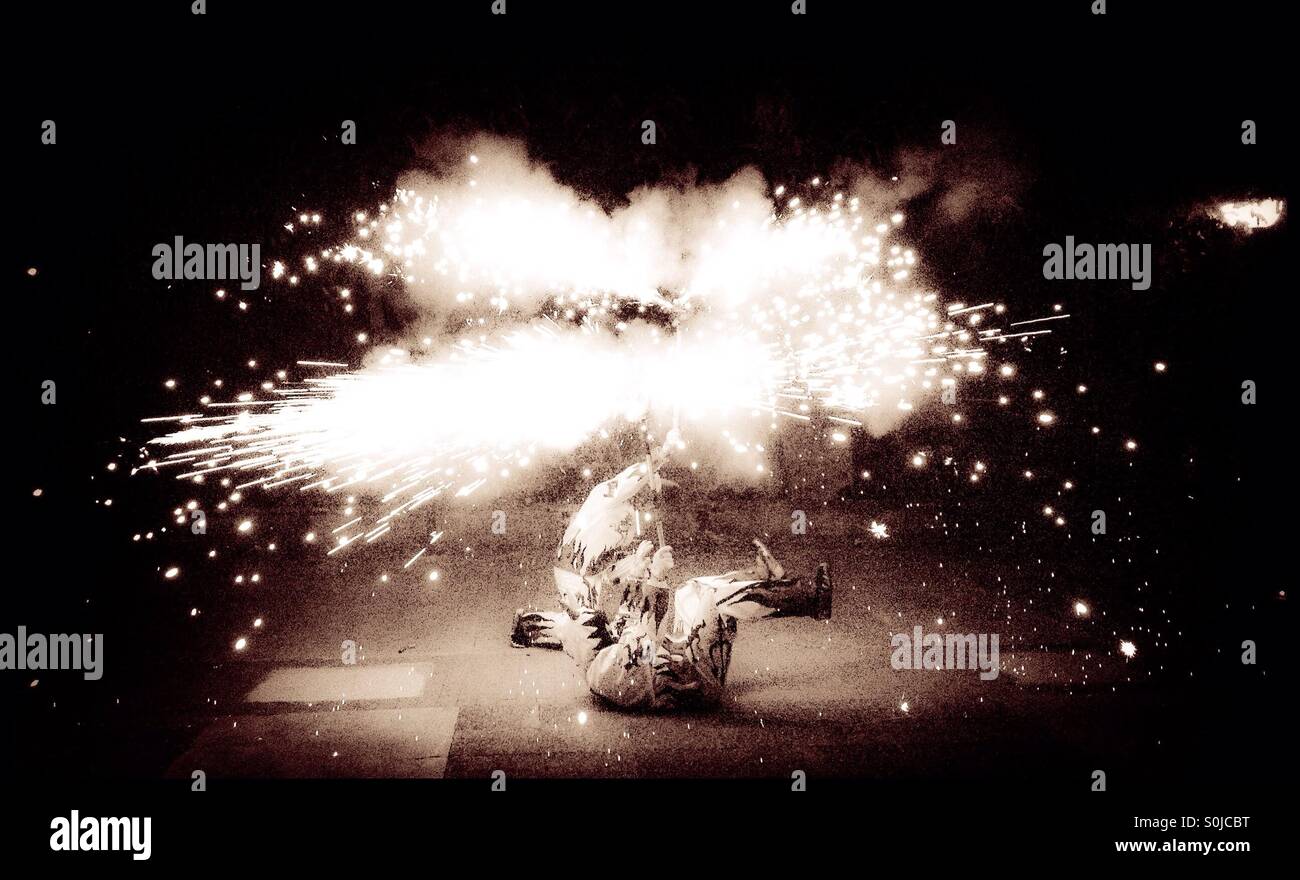 SPAIN: 23rd August 2015. Les Diables perform their firework dance marking the last night of the Fiesta Major in Ascó, Catalonia, Spain. - Smartphone Captured Stock Image