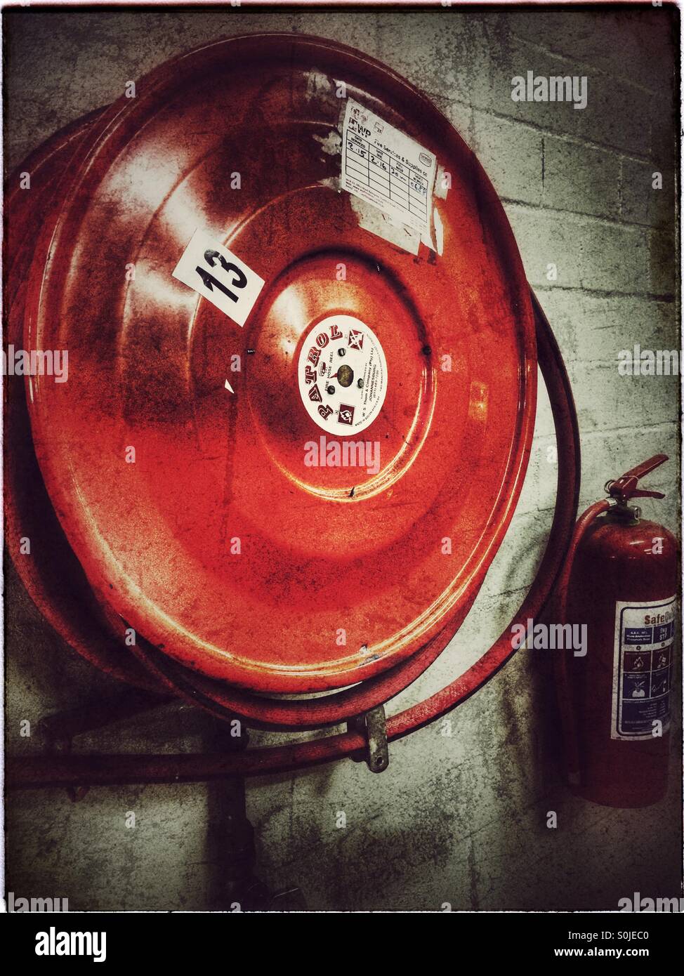 Fire hose wall hi-res stock photography and images - Alamy