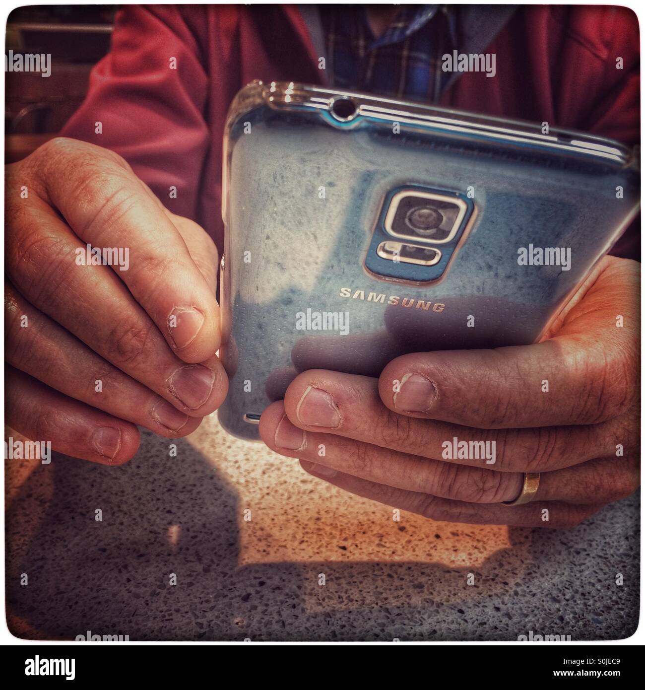 Man using smartphone . - Smartphone Captured Stock Image