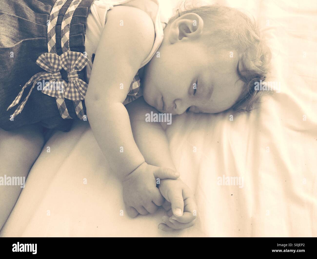 Baby girl sleeping hi-res stock photography and images - Alamy