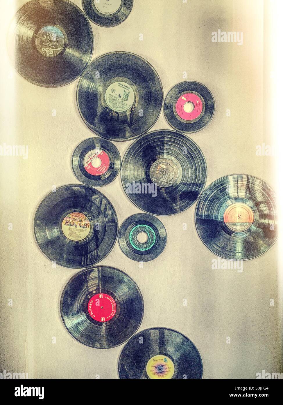 Vintage vinyl records both 45's and 33 long playing. Stock Photo
