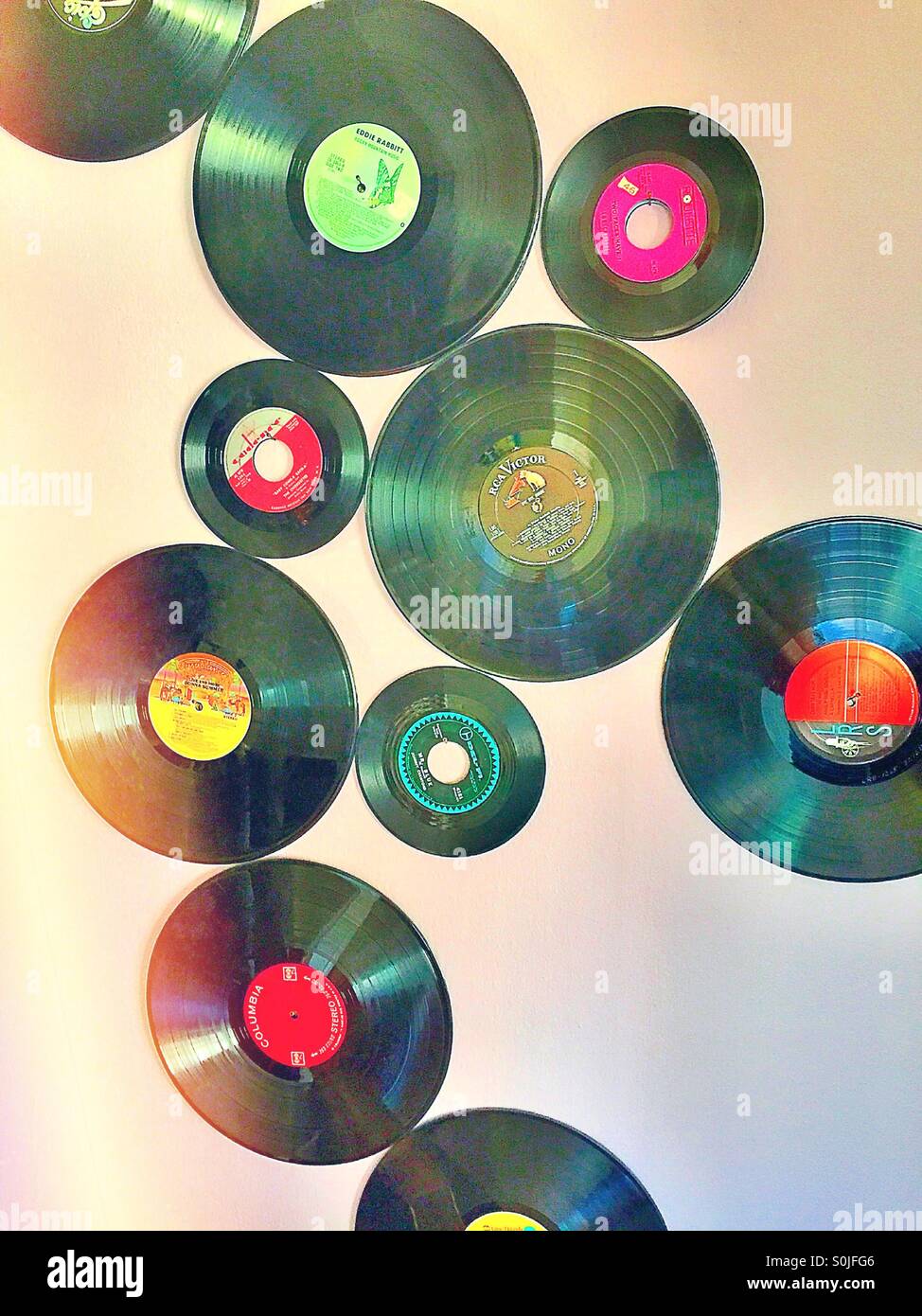 Vintage vinyl 45's and 33 longplaying records. Stock Photo