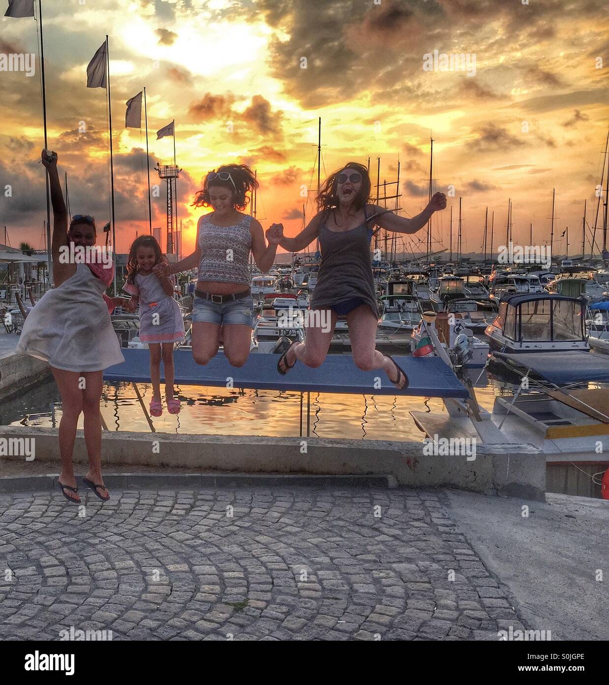 Women jumping in air - Smartphone Captured Stock Image