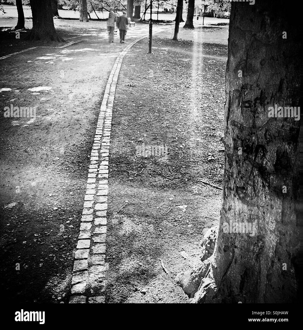 Senior couple walking Black and White Stock Photos & Images - Alamy