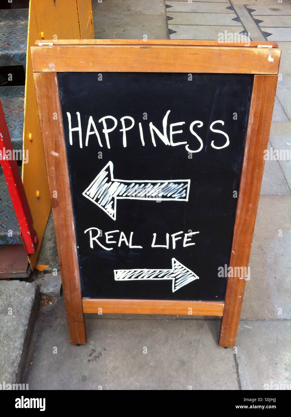 Happiness, real life sign. Stock Photo