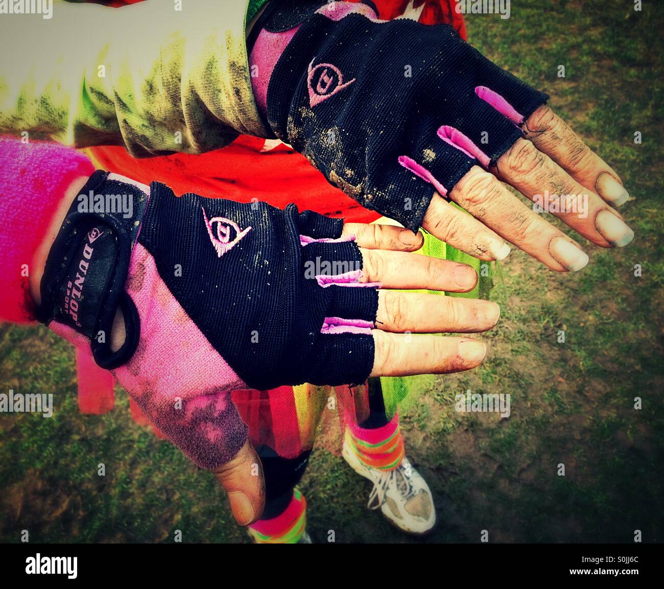 Muddy hands after mud run - Smartphone Captured Stock Image