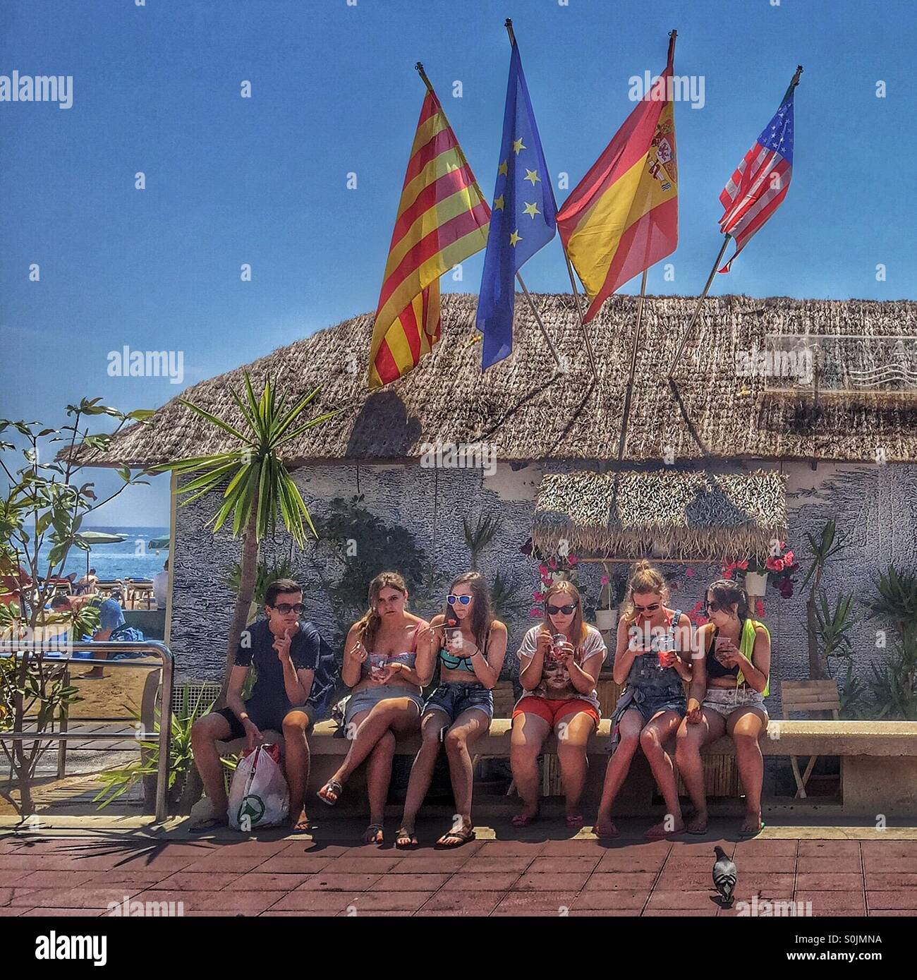 Young people eating ice cream, Lloret de mar,Catalunya,Costa Brava,Spain - Smartphone Captured Stock Image