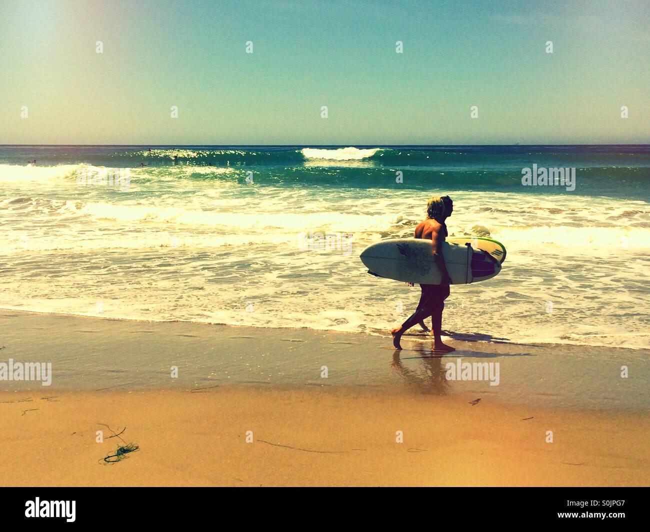 Surfers at Jalama Beach, near Lompoc, California USA Stock Photo