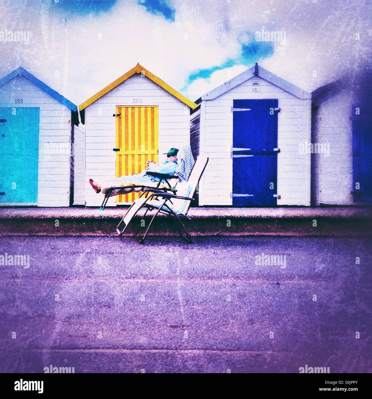 Man and beach huts - Smartphone Captured Stock Image