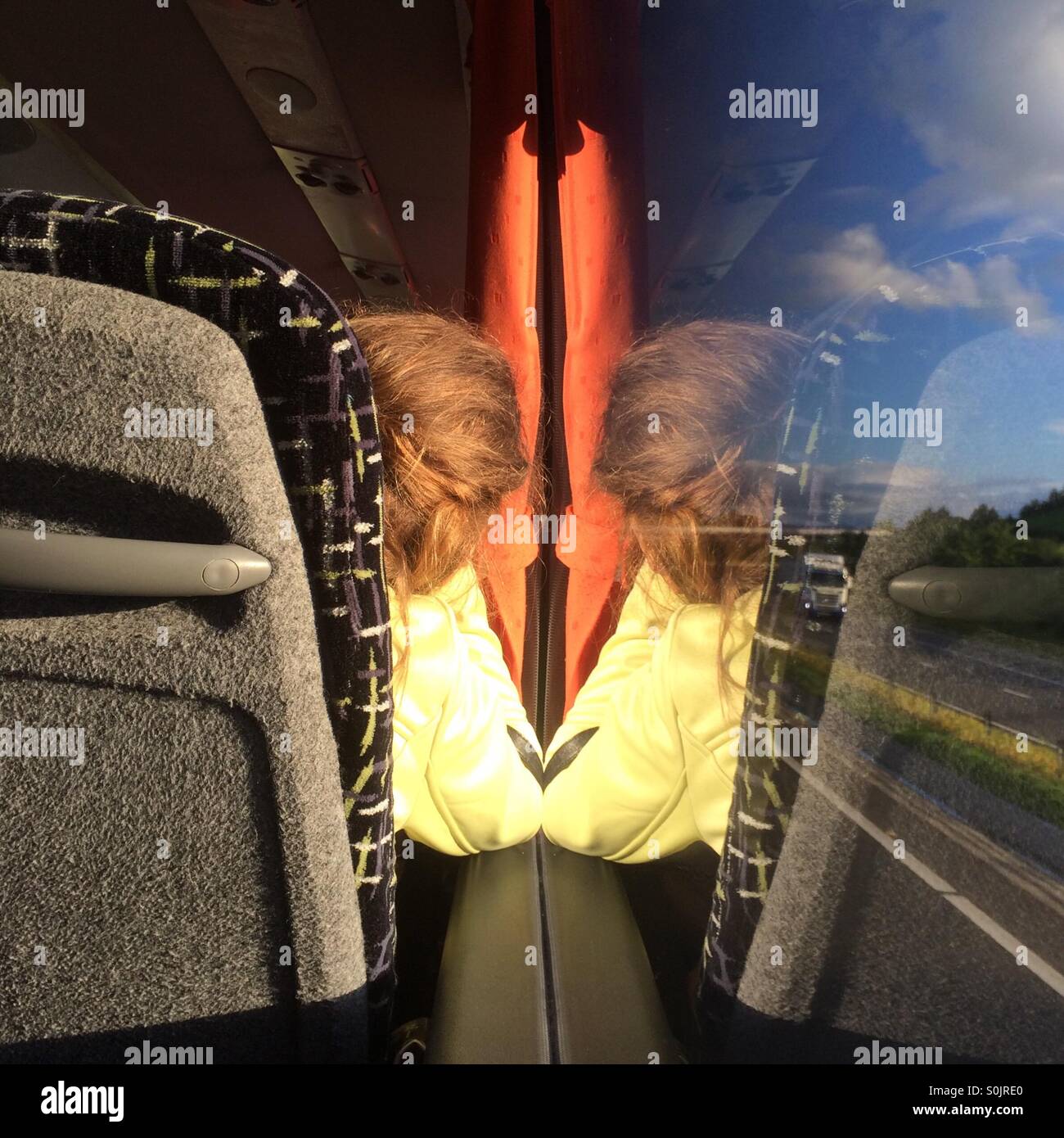 Passenger reflection in bus window - Smartphone Captured Stock Image