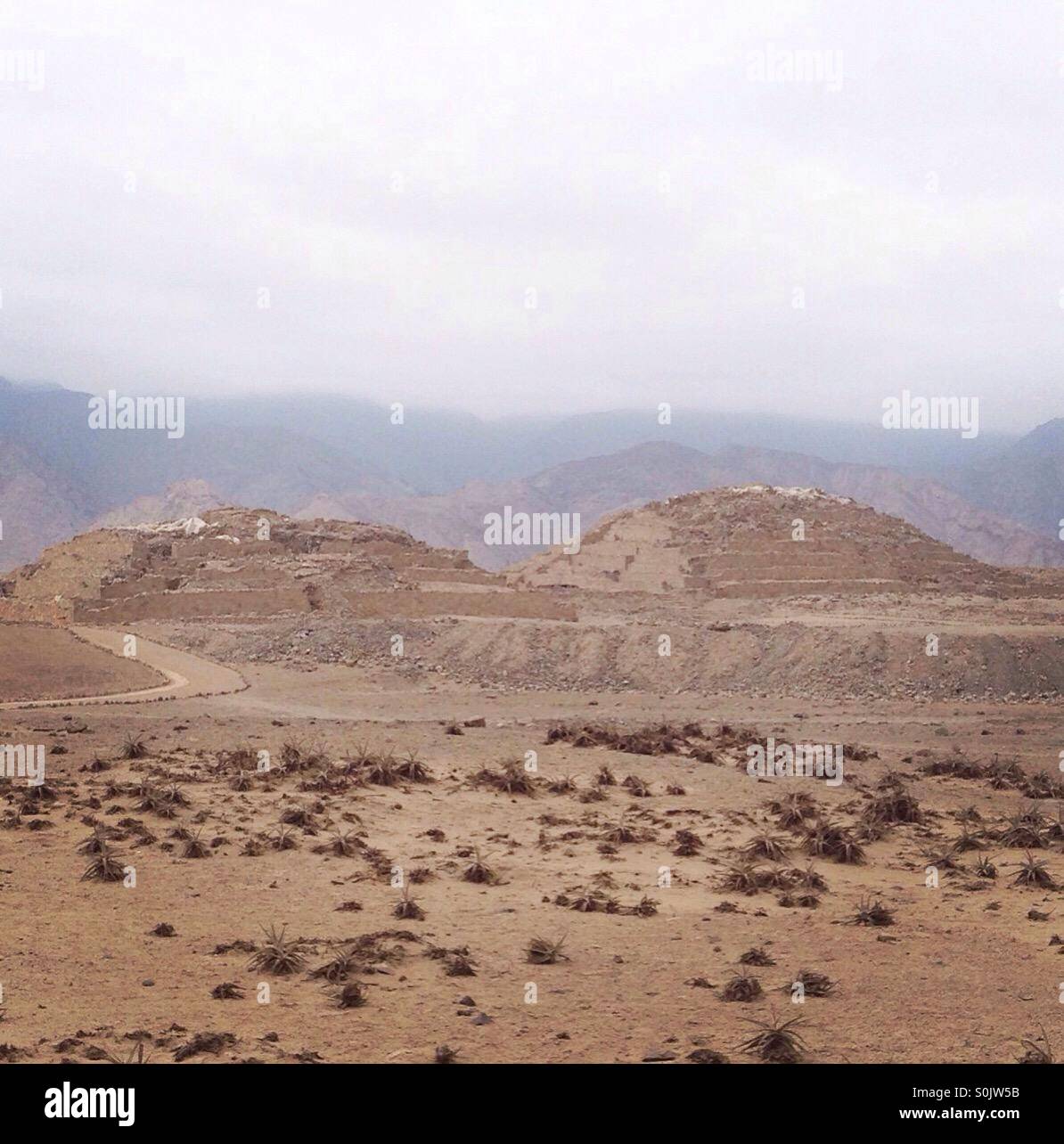 Pyramids at ancient site of Caral, Peru, the oldest settlement in South America, dating back to 2600BC. Stock Photo