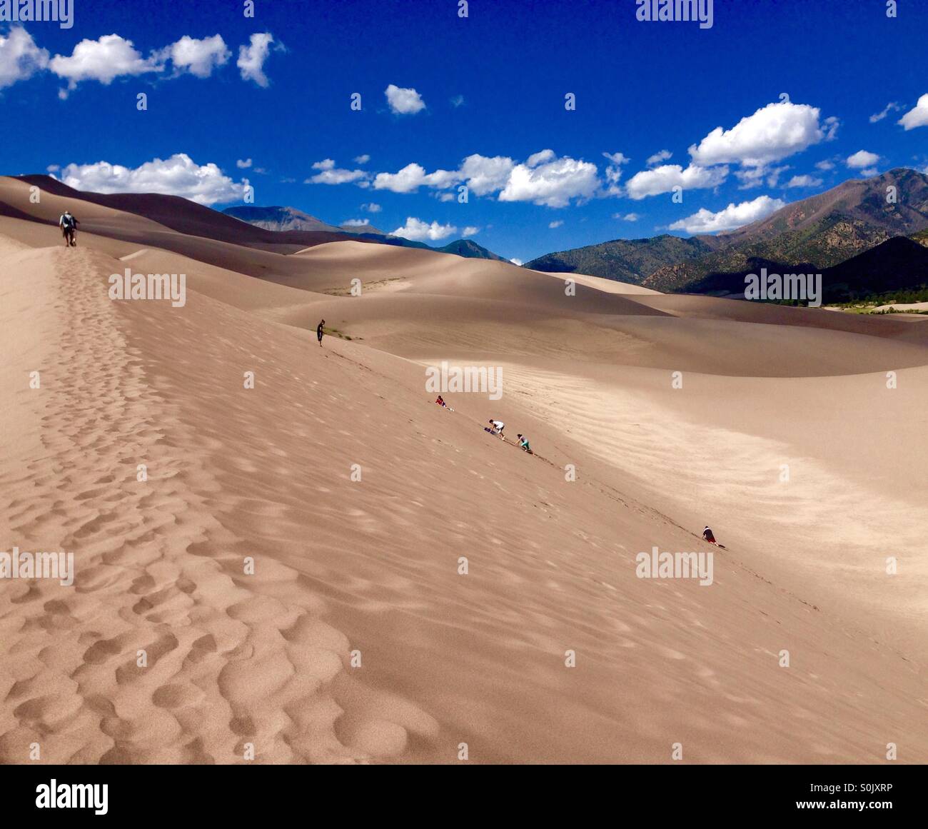 People hiking sand dunes hi-res stock photography and images - Alamy