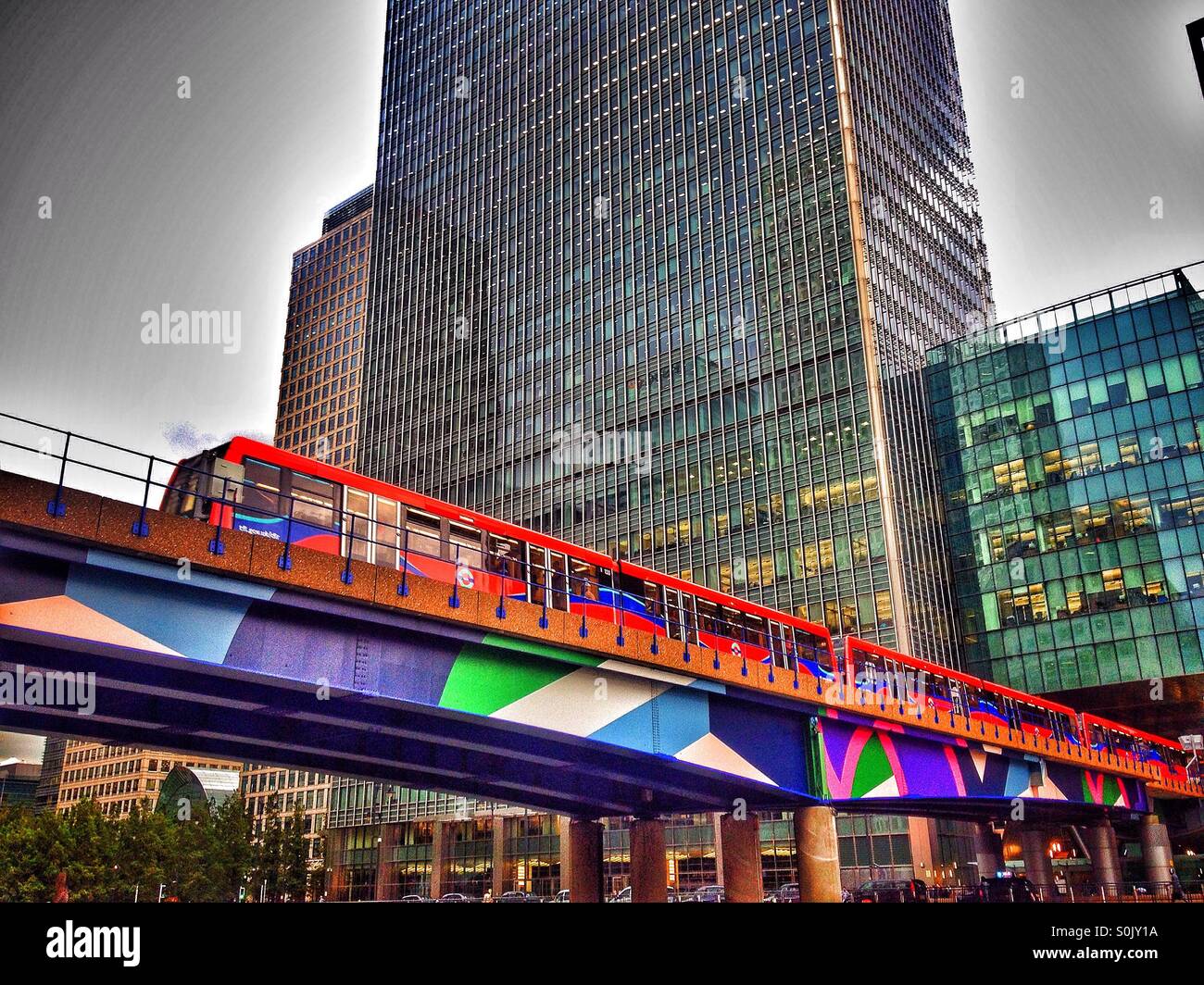 DLR with skyscrapers in background Docklands London Stock Photo - Alamy