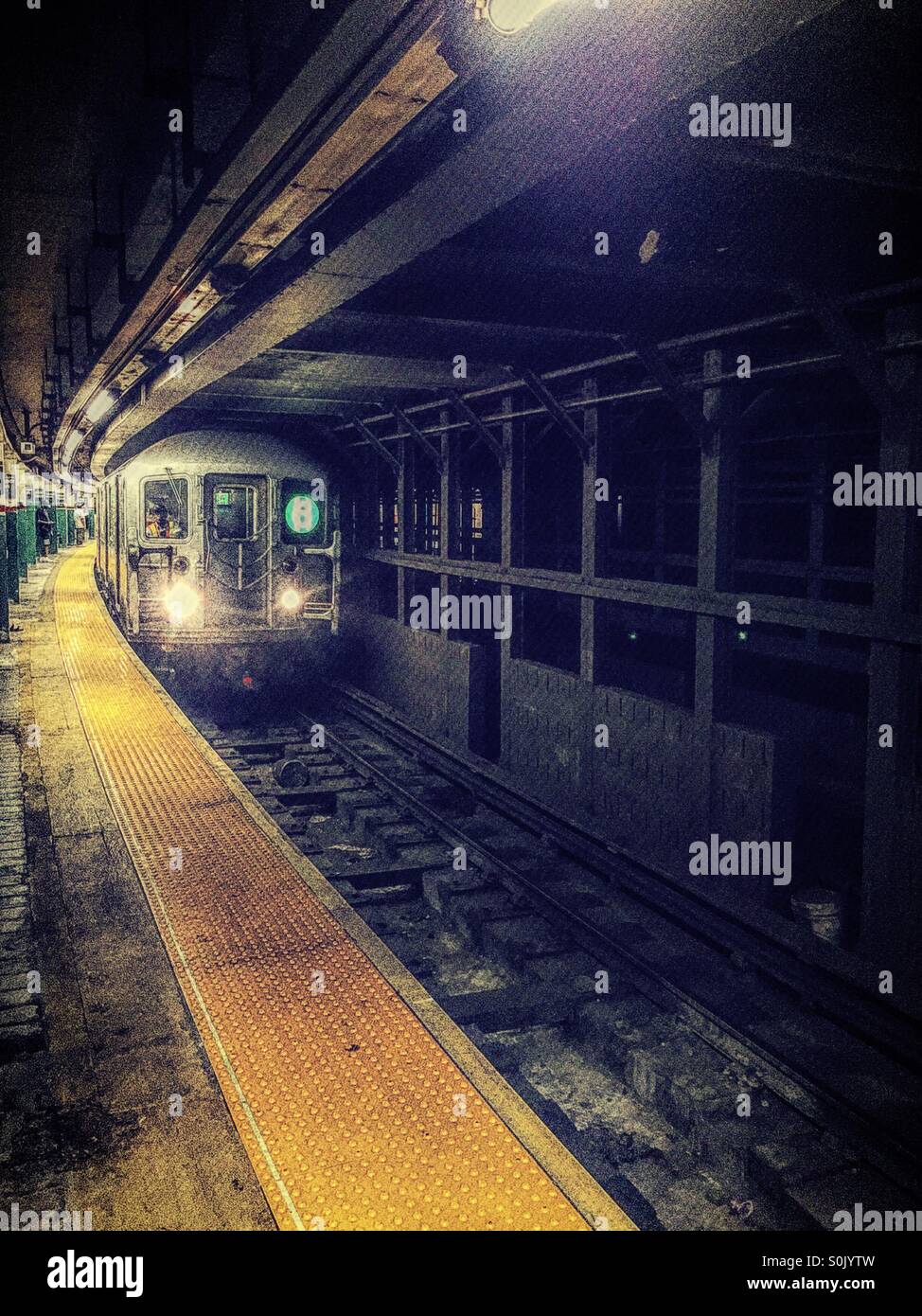 Six train arrives at Astor Place station, New York City. Stock Photo