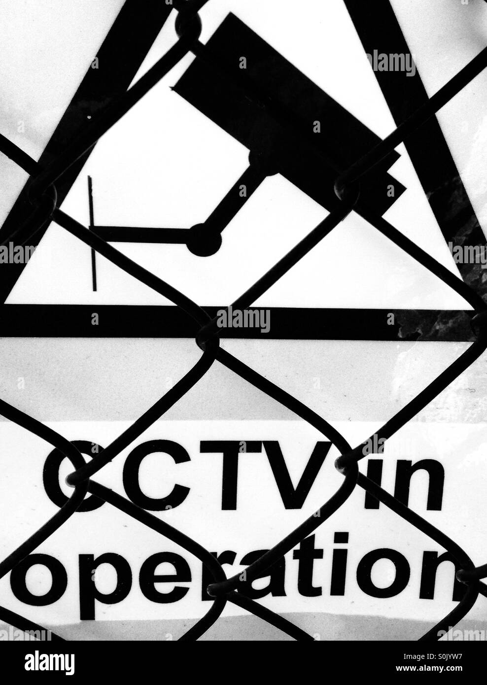 Sign cctv in operation Black and White Stock Photos & Images - Alamy