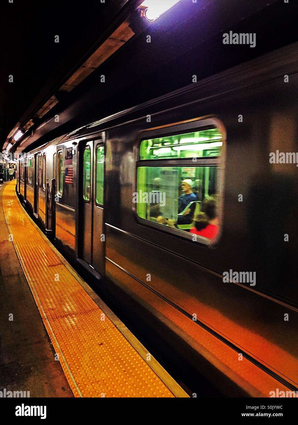 Subway train at station on six line, New York City - Smartphone Captured Stock Image