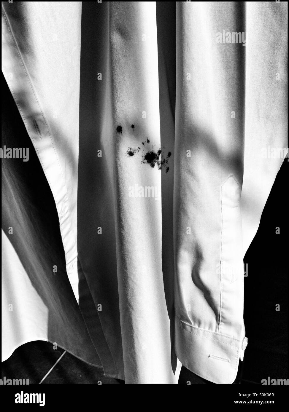 Ink stains on white shirt. - Smartphone Captured Stock Image