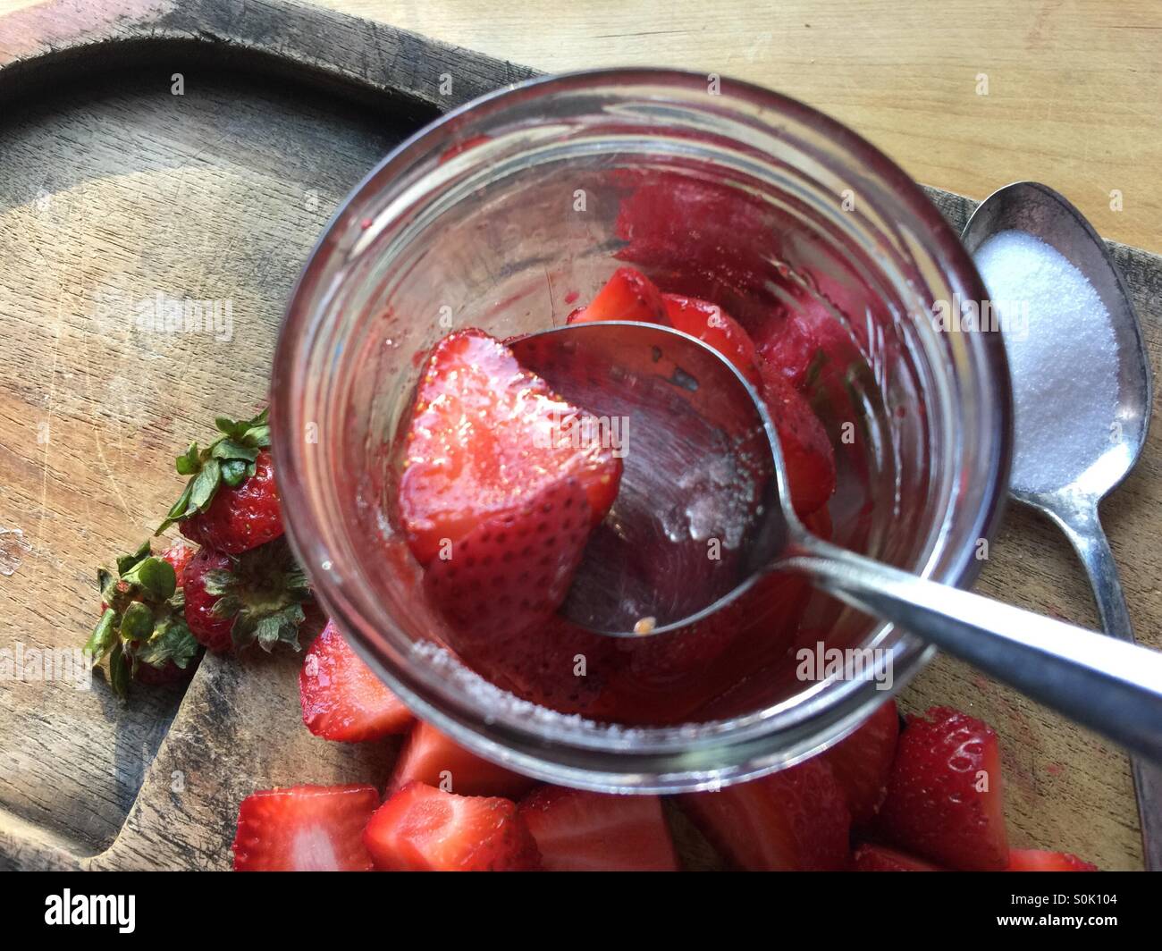 Macerated strawberries in a jar Stock Photo Alamy